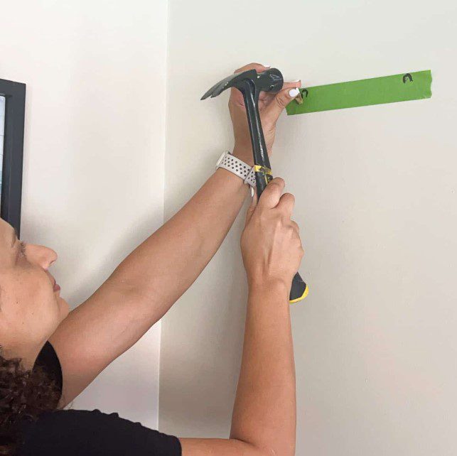 How To Hang Things On Cement Walls Without Drilling Holes